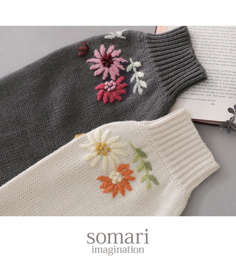 手刺繍の立体感が際立つ上質なニットカーディガン。丁寧に編み上げられたリブ仕立ての袖口と温かみあふれる手刺繍があしらわれ、細部までこだわりが詰まった仕上がりです。