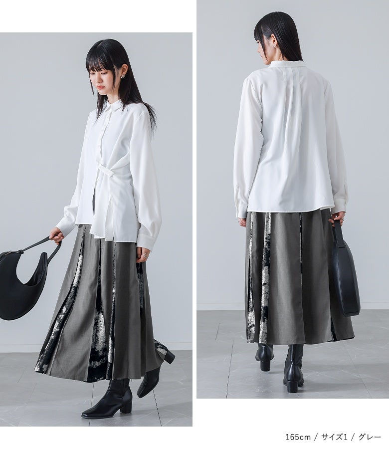 グレーの箔プリント切替フレアスカート。ウエスト後ろのZipデザインと引き伸ばされた長めテープが、バックスタイルまで抜かりなく印象的におしゃれに仕立てます。