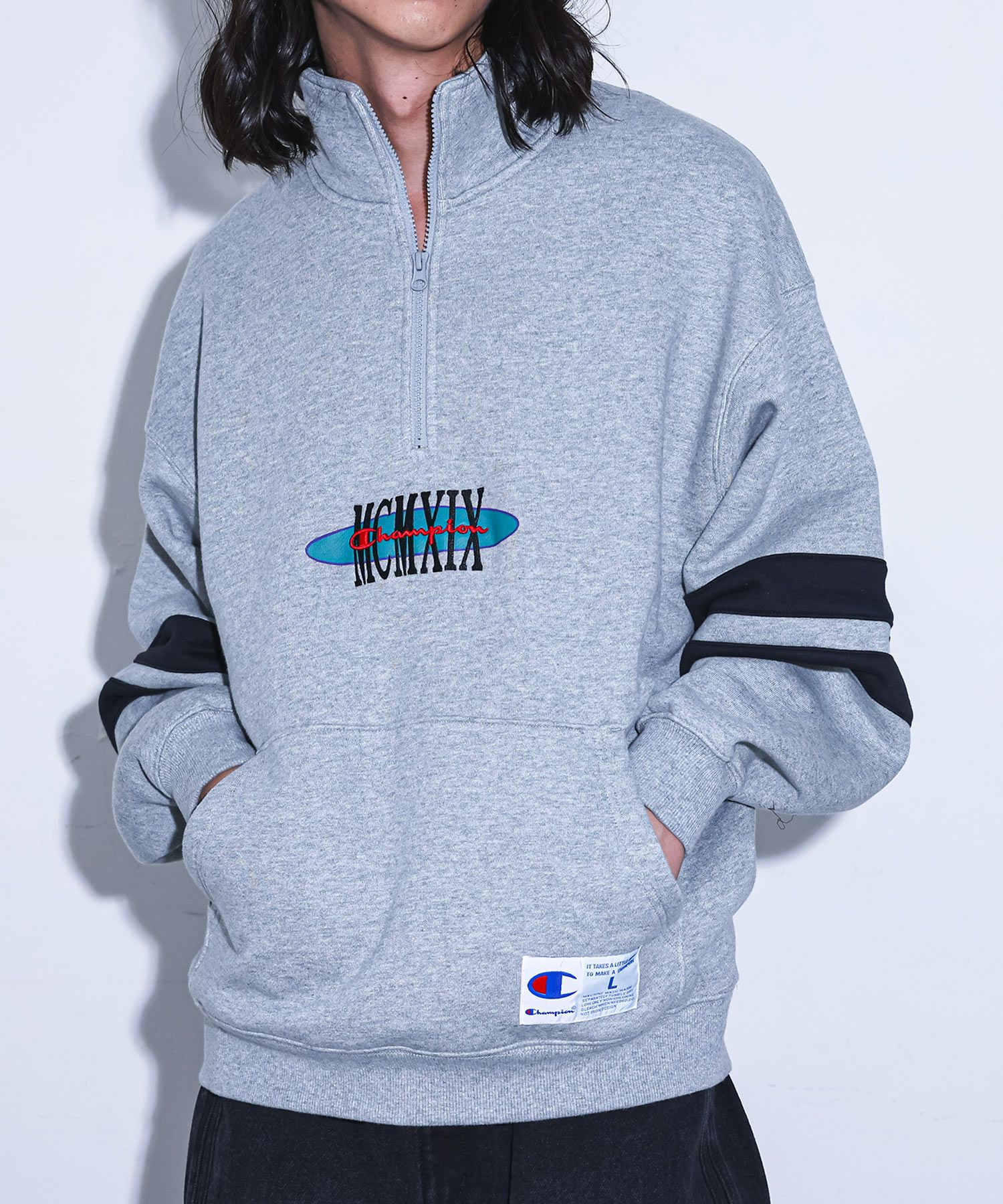 Champion袖ラインロゴ刺繍ハーフジップトップス』