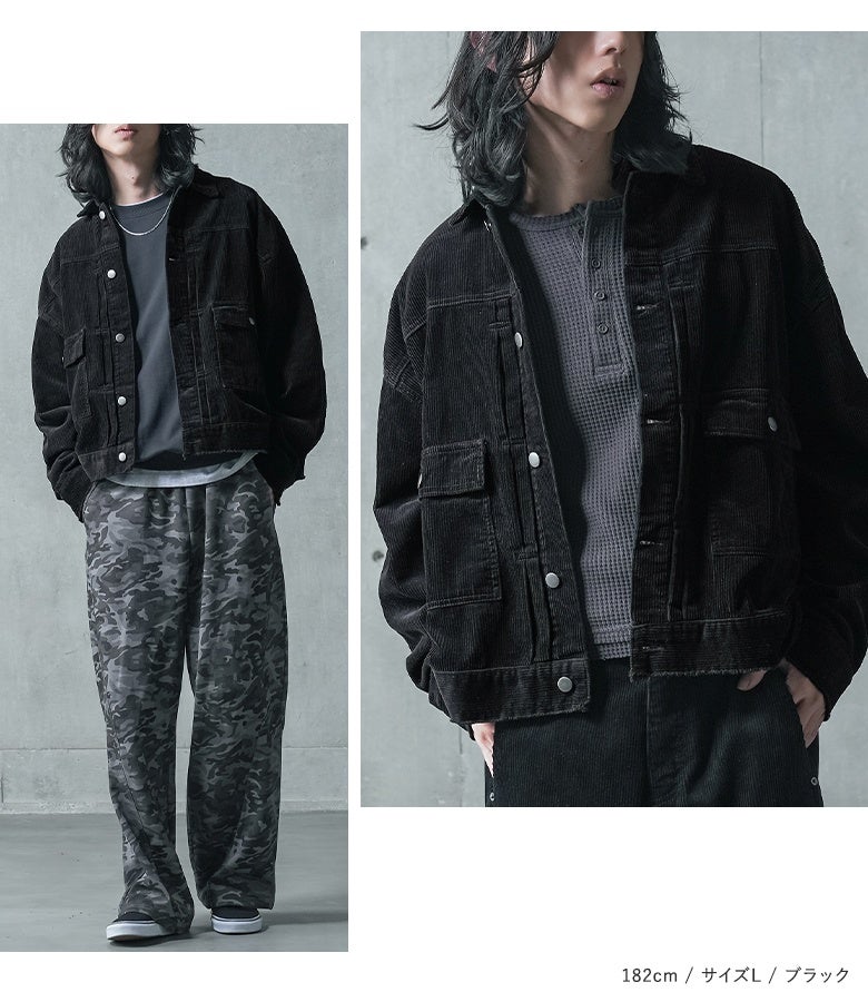 ブラックのコーデュロイトラッカージャケット。ゆとりのあるドロップショルダーとショート丈が、カモフラ柄パンツなどの個性派ボトムスとも相性良くまとまります。